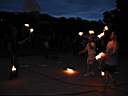 01_0068.JPG: Eeyore's Birthday 2004:  Jim, Phil & Duane juggling torches