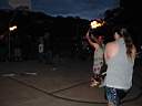 01_0069.JPG: Eeyore's Birthday 2004:  Jim & Phil juggling torches